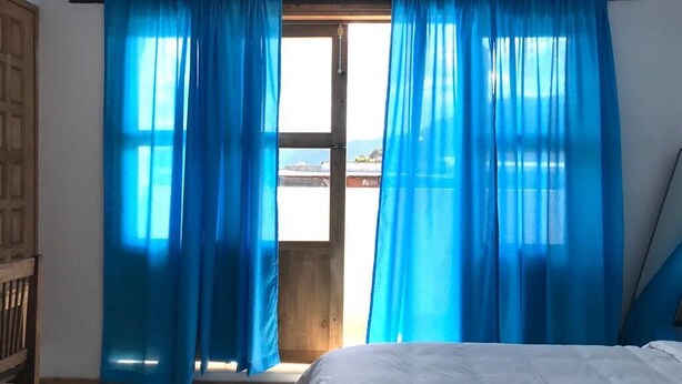 Room, 1 King Bed, Mountain View | In-room safe, soundproofing, iron/ironing board (on request), free WiFi - Hotel Pepe Pancho (San Cristóbal de las Casas)