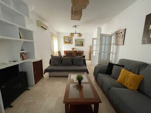 Flat-screen TV, fireplace