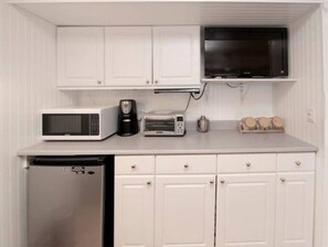 Fridge, microwave, coffee/tea maker, toaster