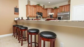 Fridge, microwave, oven, stovetop - 8BR 5BA Pool Home In ChampionsGate (Davenport)