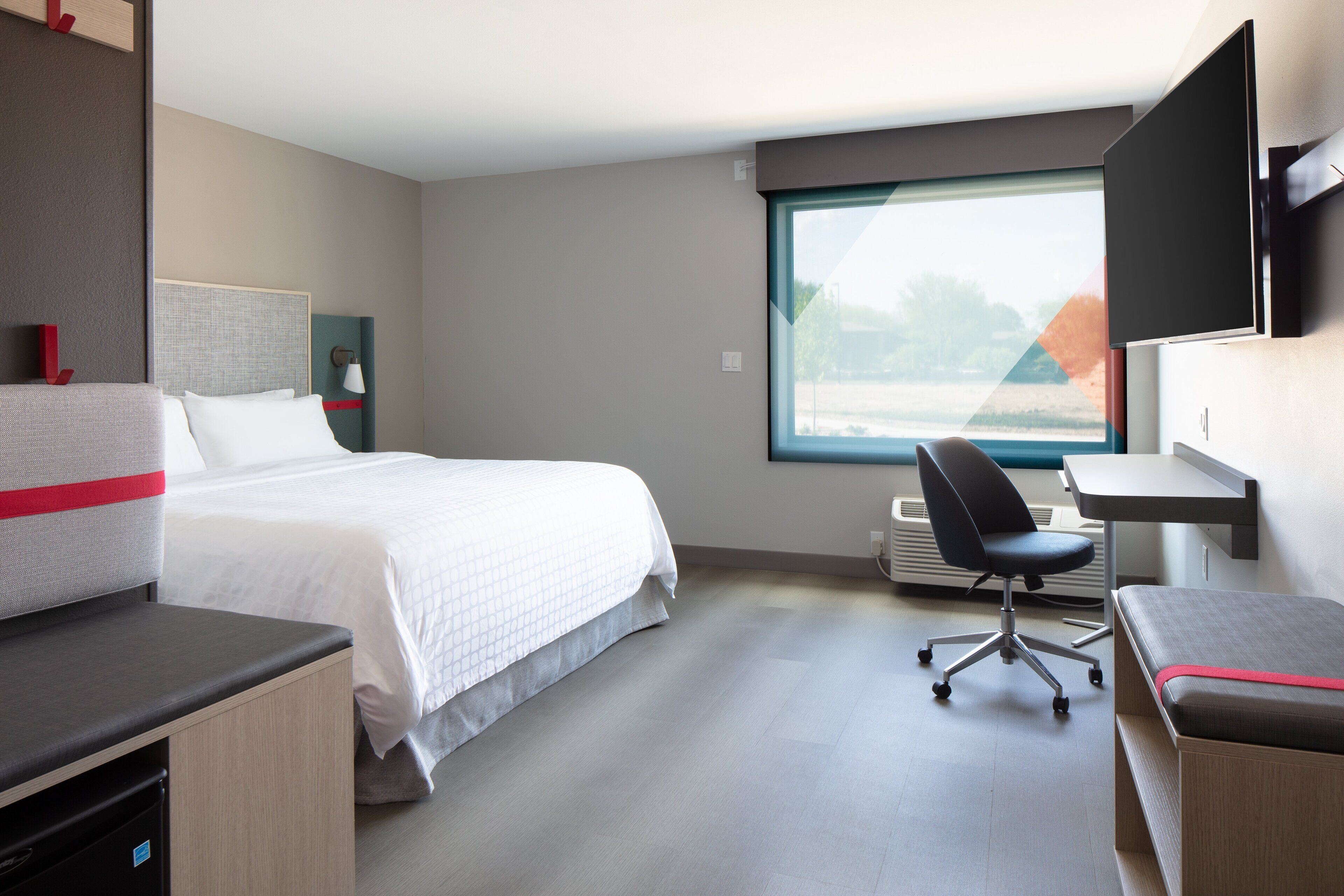 pillow-top beds, desk, laptop workspace, blackout curtains