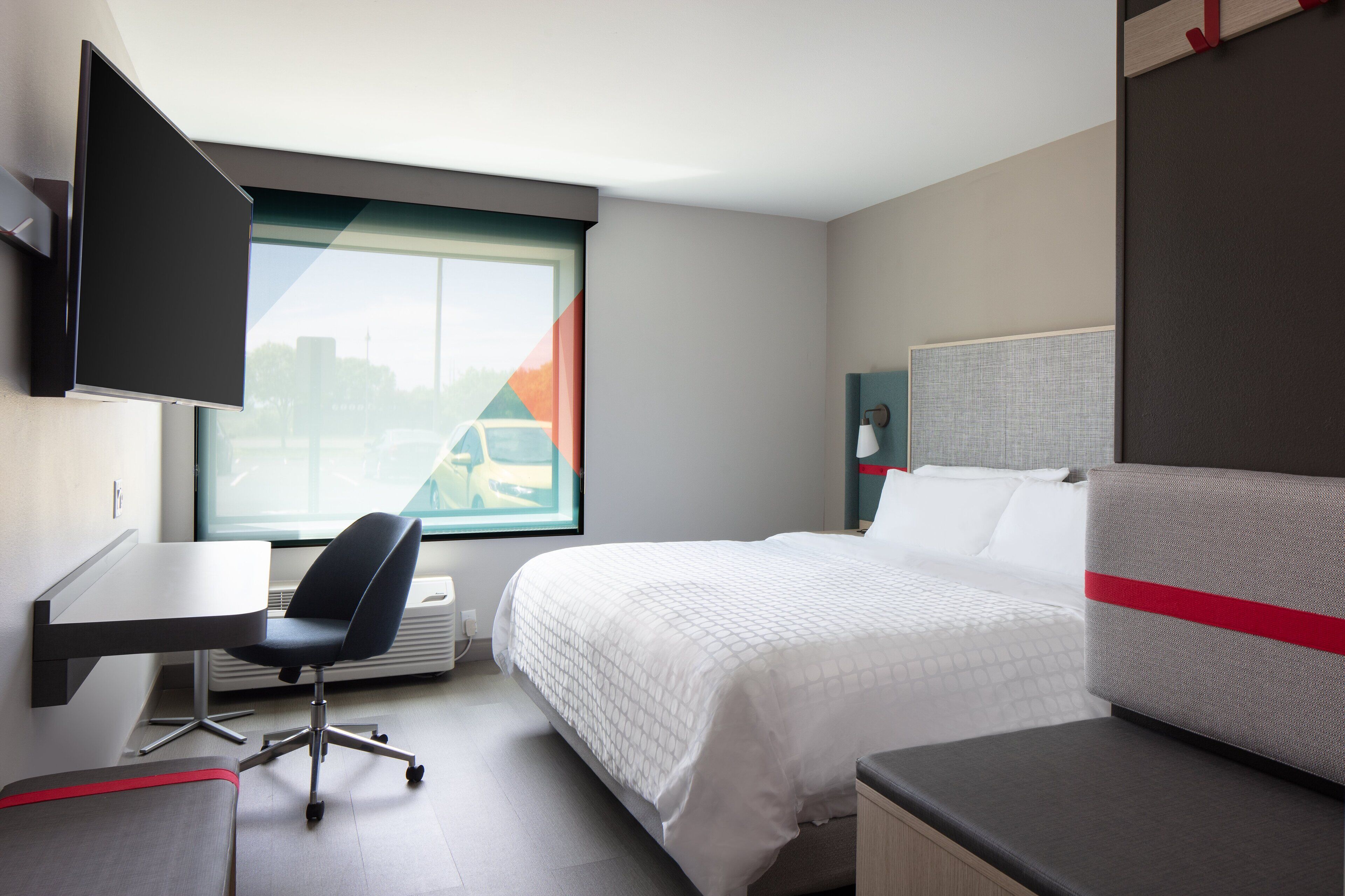 pillow-top beds, desk, laptop workspace, blackout curtains