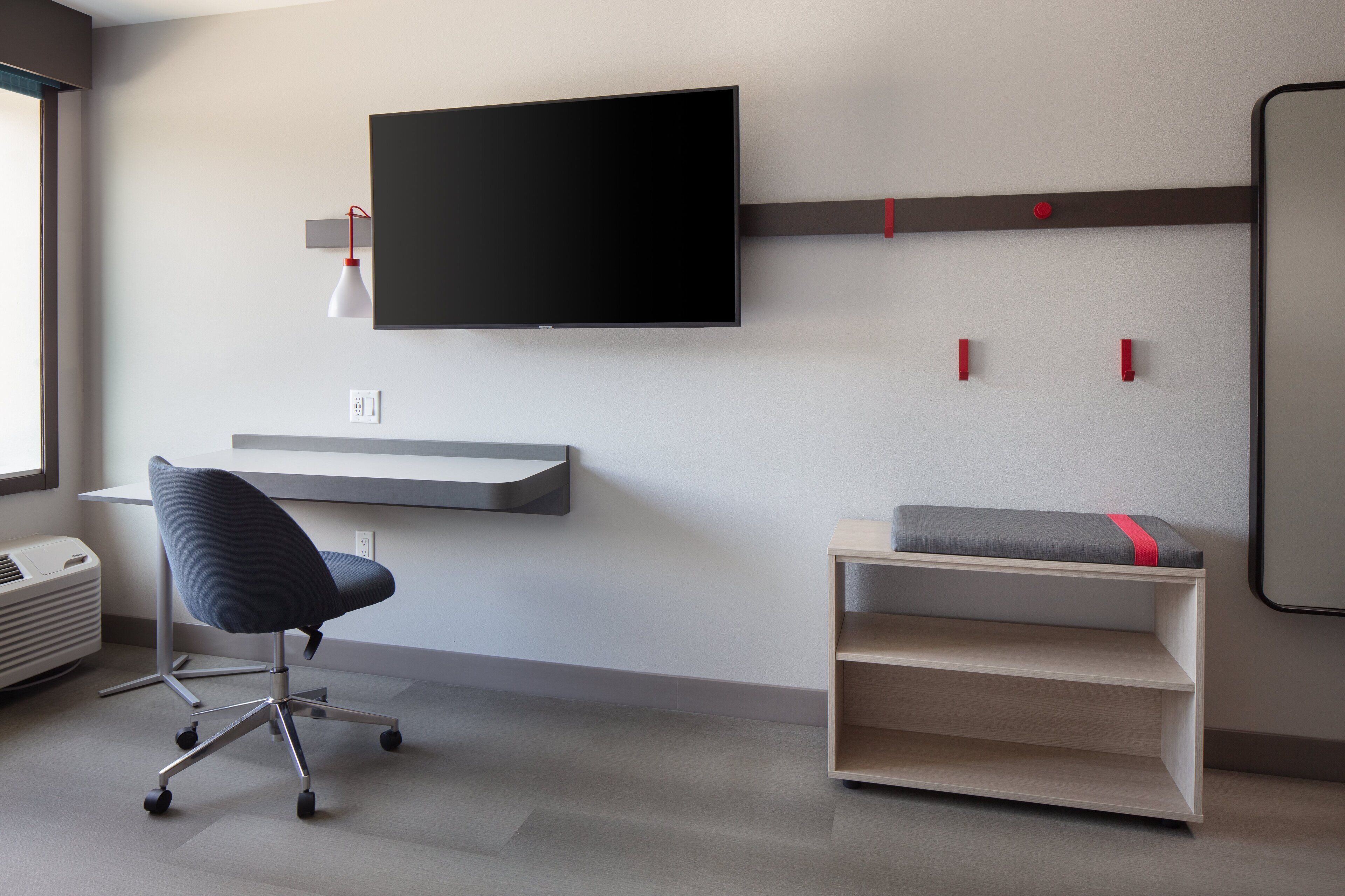 pillow-top beds, desk, laptop workspace, blackout curtains