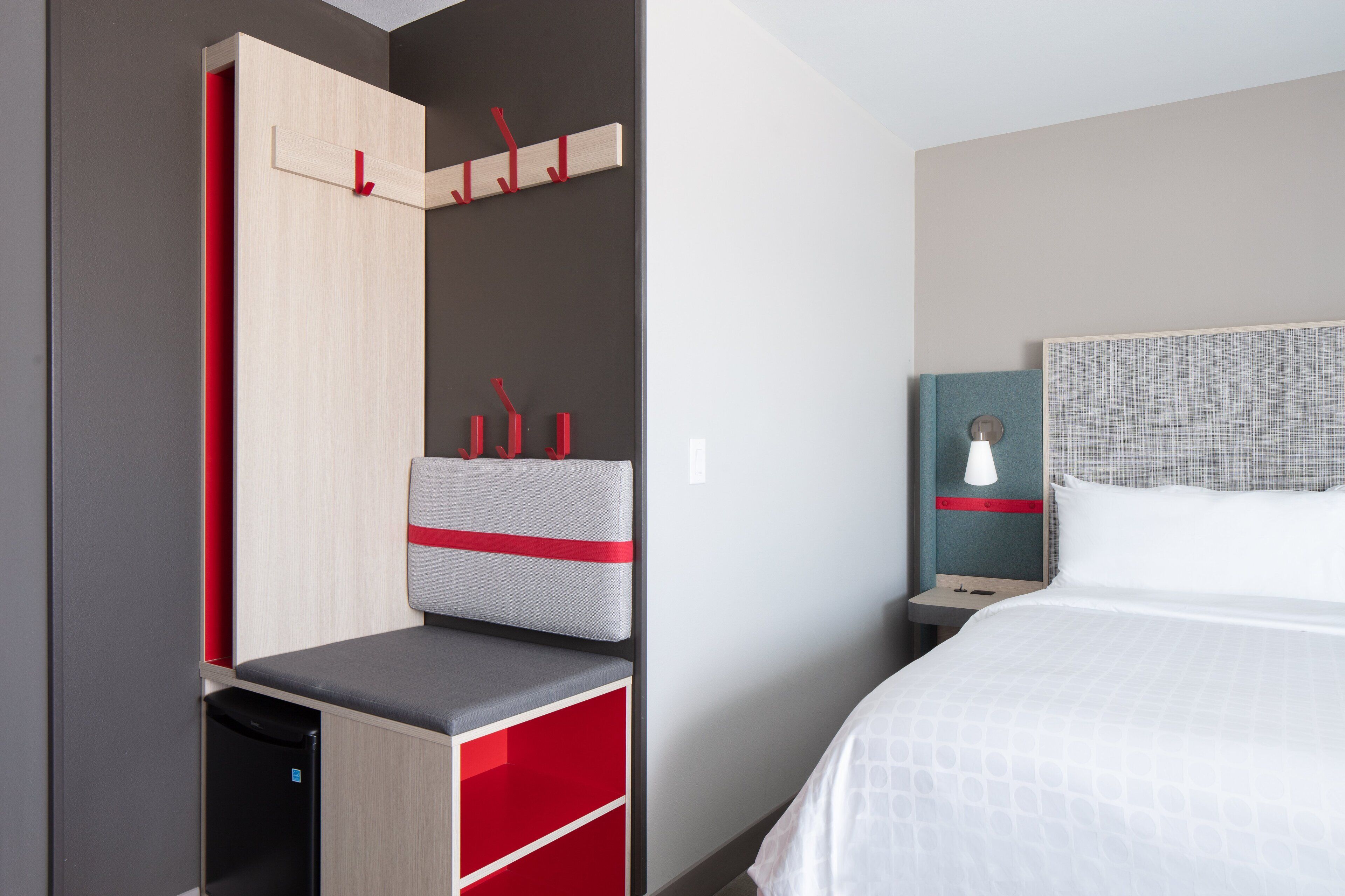 pillow-top beds, desk, laptop workspace, blackout curtains