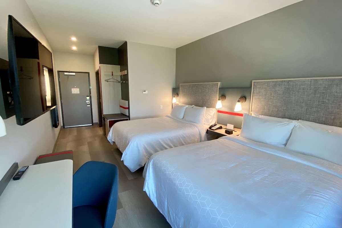 pillow-top beds, laptop workspace, blackout curtains, soundproofing