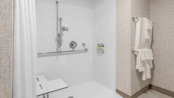 Basic Single Room, 1 King Bed with Sofa bed, Mobility Accessible (Roll-In Shower) | Bathroom | Designer toiletries, hair dryer, towels, soap