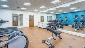A gym with treadmills, dumbbells, and exercise equipment. - Holiday Inn Express & Suites Elkhart North by IHG (Elkhart)