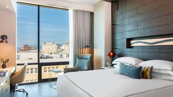 Frette Italian sheets, premium bedding, down comforters, minibar