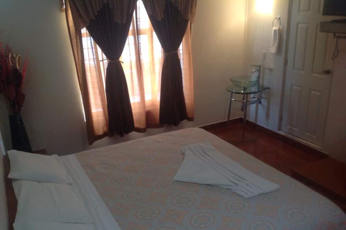 Junior Suite | 1 bedroom, iron/ironing board, free WiFi, bed sheets
