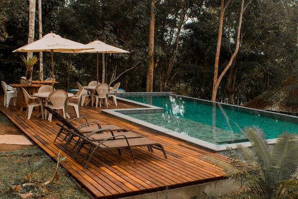 2 outdoor pools, pool umbrellas, pool loungers