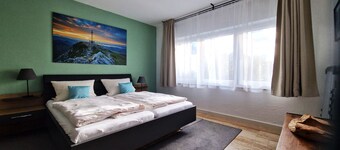Ferienwohnung 60 qm im Untergeschoss/Hanglage mit 1 Schlafzimmer und Terrasse