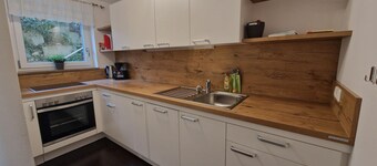 Ferienwohnung 60 qm im Untergeschoss/Hanglage mit 1 Schlafzimmer und Terrasse