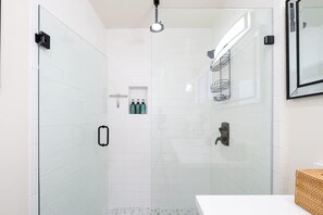 Bathtub, hair dryer, towels