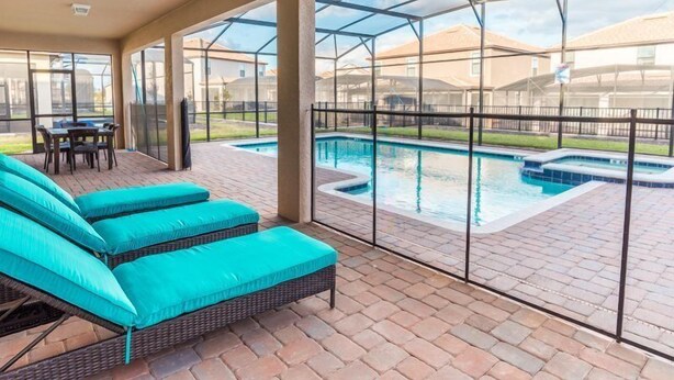 Unclassified image, 1 of 35, button - 9BR Pool Home in ChampionsGate (Davenport)