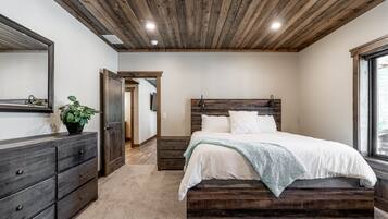 Premium bedding, down duvets, blackout curtains, iron/ironing board