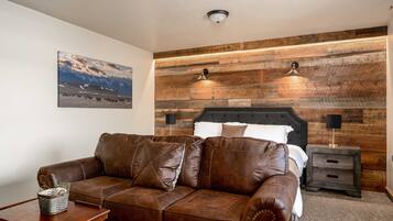 Suite studio exécutive, 1 très grand lit et 1 canapé-lit | Couette en duvet, coffre-fort, décor unique, ameublement unique