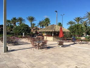 Outdoor dining - Smart HDTVs, Largest Regal Palms 4 bed/3.5 bath End Unit 1856 SqFt, Disney Close (DAVENPORT)