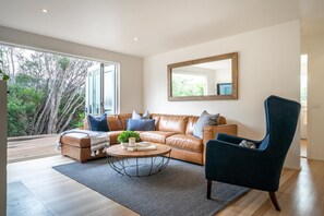 TV, fireplace - Capri House - Hear the Roar of the Ocean (Saint Andrews Beach)