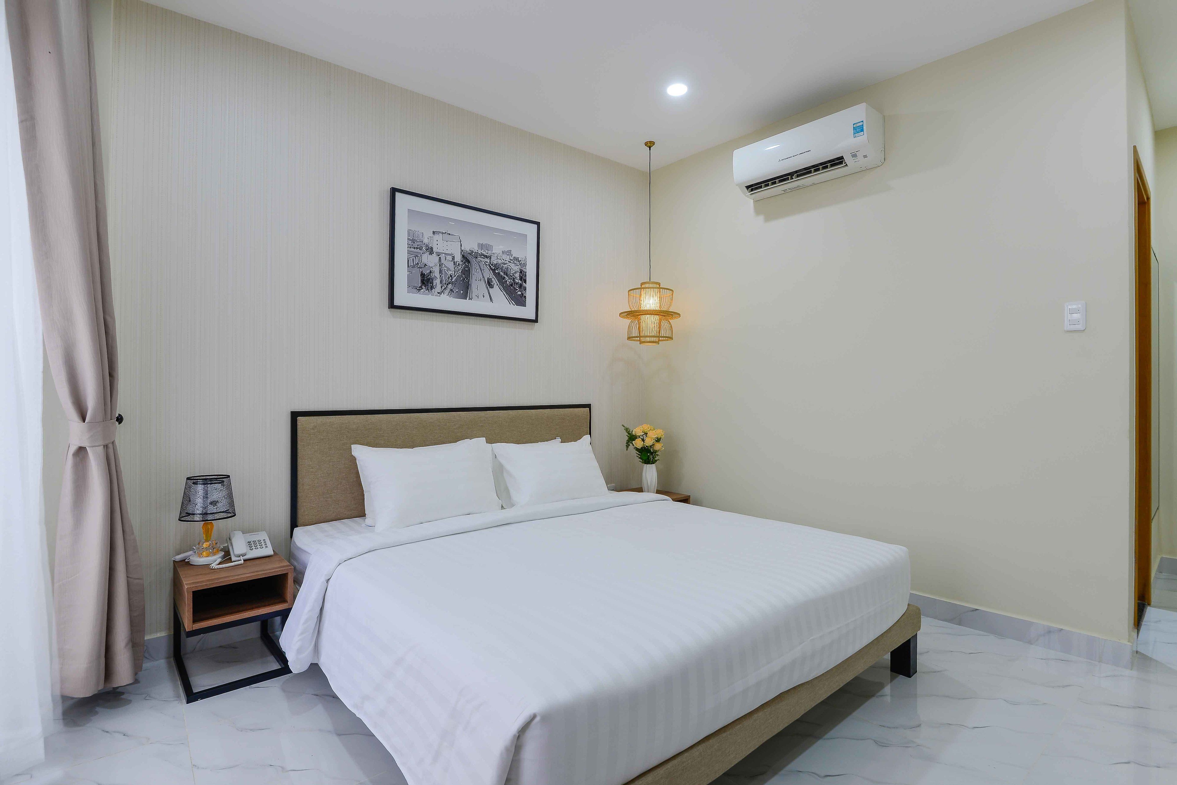 deluxe double room, 1 king bed, balcony | premium bedding, in-room safe, laptop workspace, blackout curtains