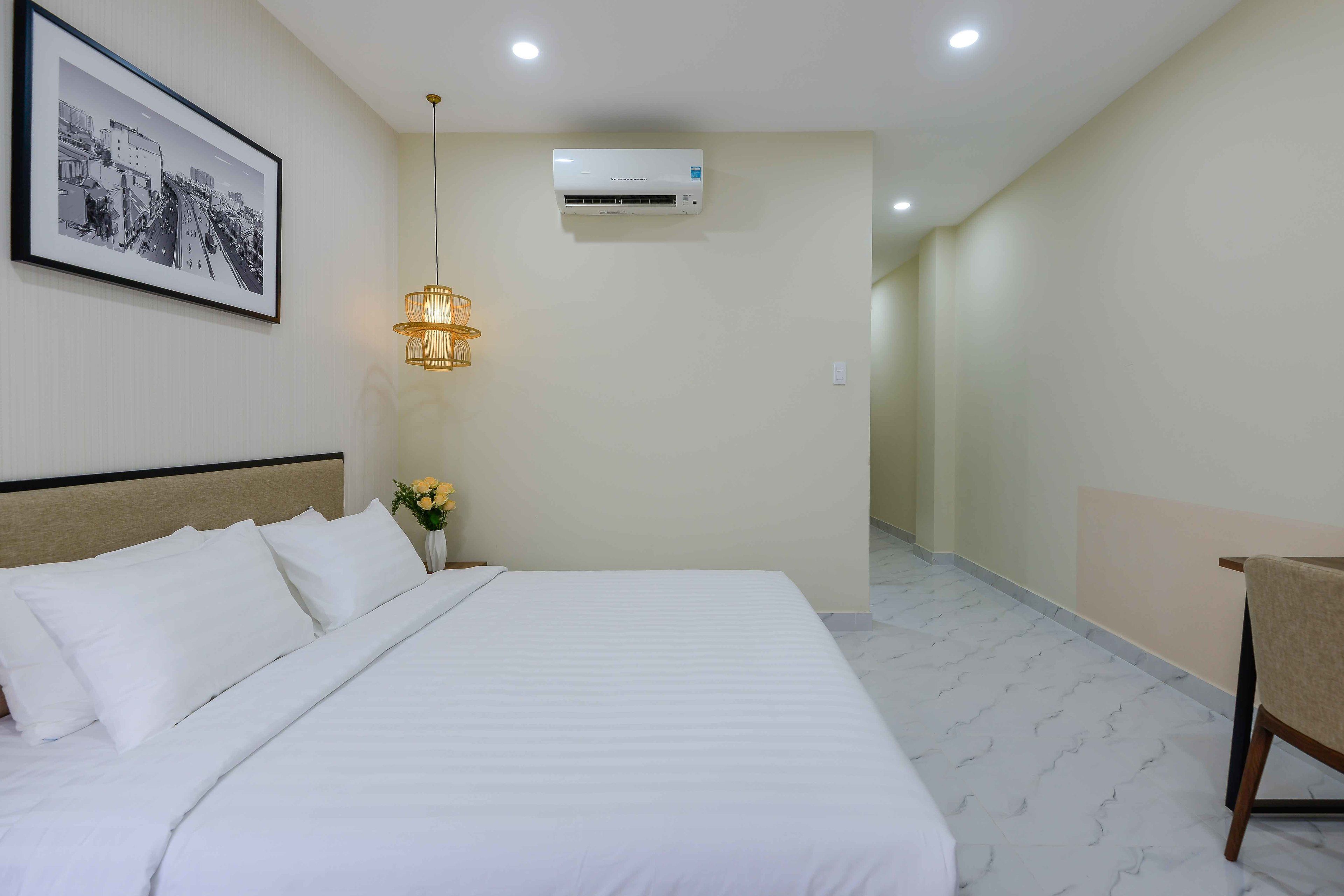 deluxe double room, 1 king bed, balcony | premium bedding, in-room safe, laptop workspace, blackout curtains