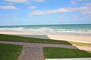 Beach - One of a kind ground floor, three bedroom, three bath corner.  Amazing south east ocean views. (New Smyrna Beach)