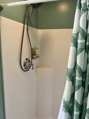 Combined shower/tub, hair dryer, towels, soap