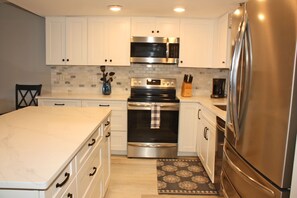 Microwave, dishwasher, coffee/tea maker, ice maker