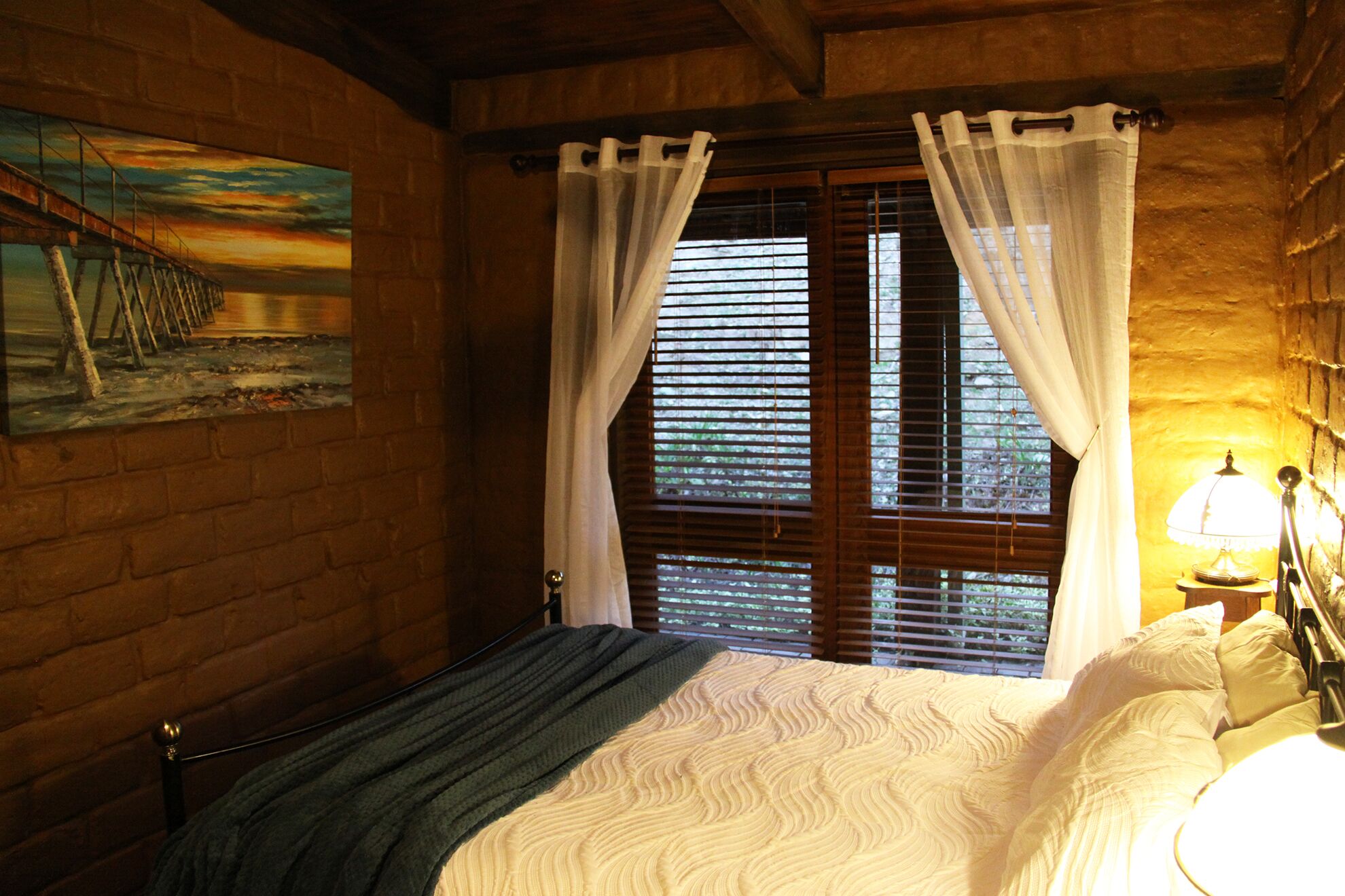 Secluded artistic earthen home offering spa luxury — image 15