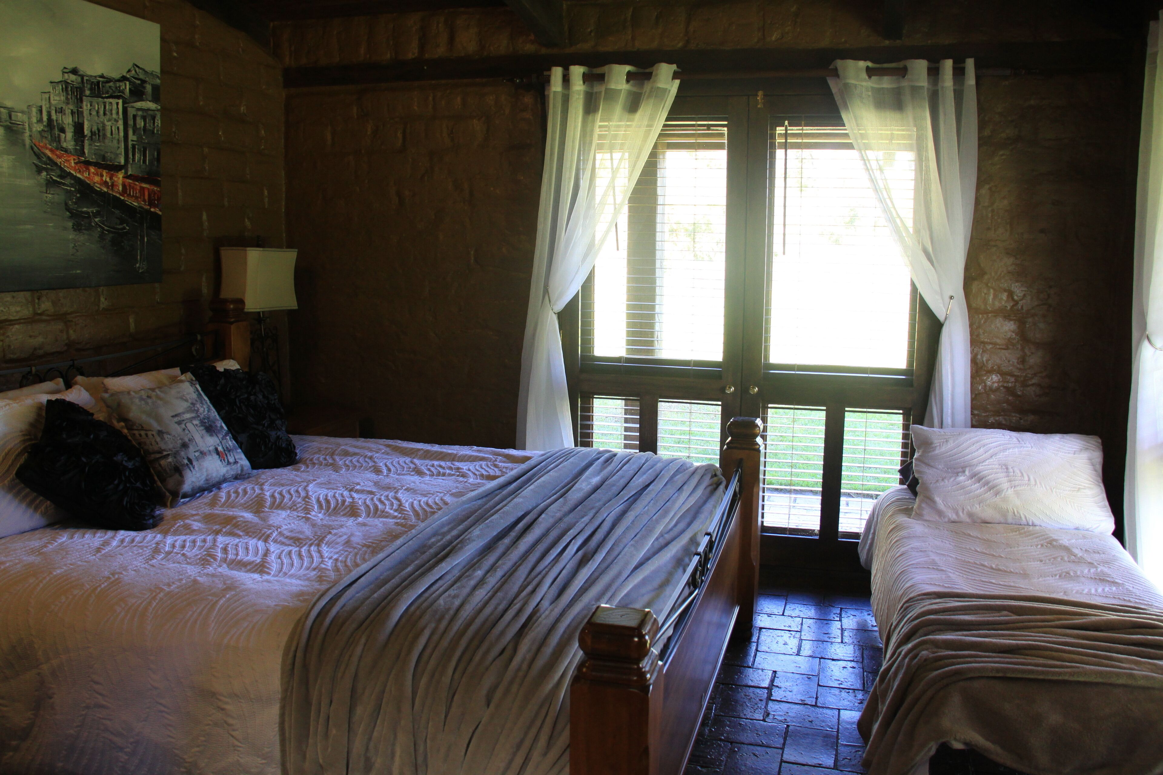 Secluded artistic earthen home offering spa luxury — image 12