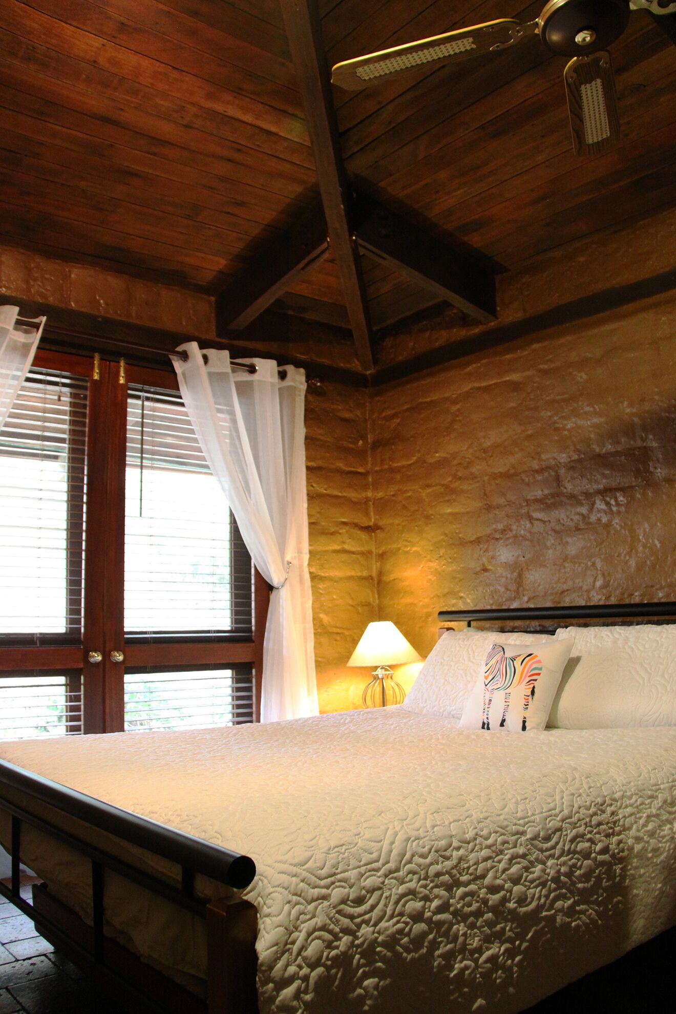 Secluded artistic earthen home offering spa luxury — image 13