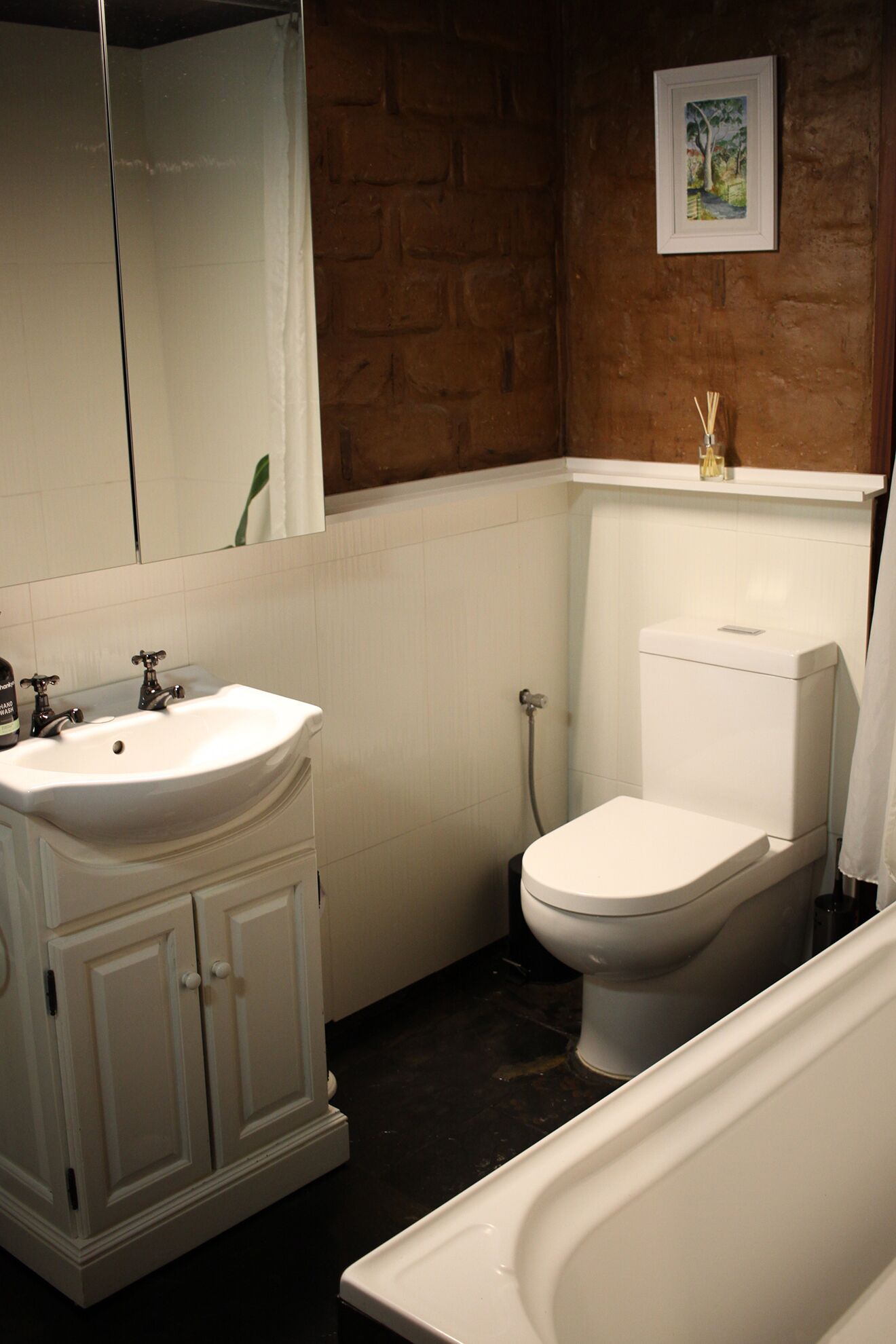 Secluded artistic earthen home offering spa luxury — image 11