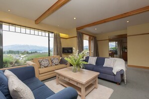 TV, fireplace - Bullock Creek Chalet · Lake & mountain views (Wanaka)