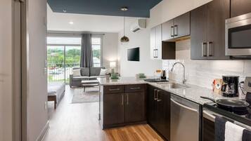 Coffee/tea maker, fridge, microwave, oven