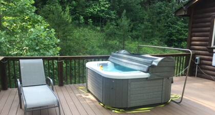 Secluded Log Home on 10 acres w creek, garden, trails, fire pit, FP, Sleeps 10