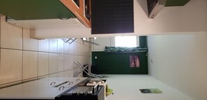 Microwave, coffee/tea maker, toaster, cookware/dishes/utensils