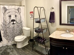 Combined shower/tub, hair dryer, towels, soap