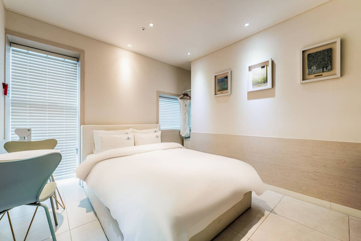 Economy Room, City View | 1 bedroom, down comforters, individually decorated