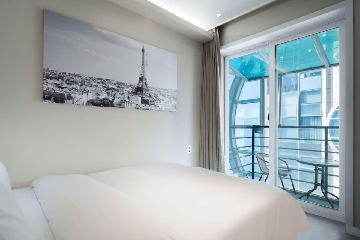 Terrace Double Room, City View (Partial Ocean View) | 1 bedroom, down comforters, individually decorated