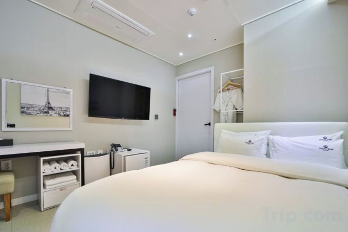 Down comforters, desk, blackout drapes, soundproofing