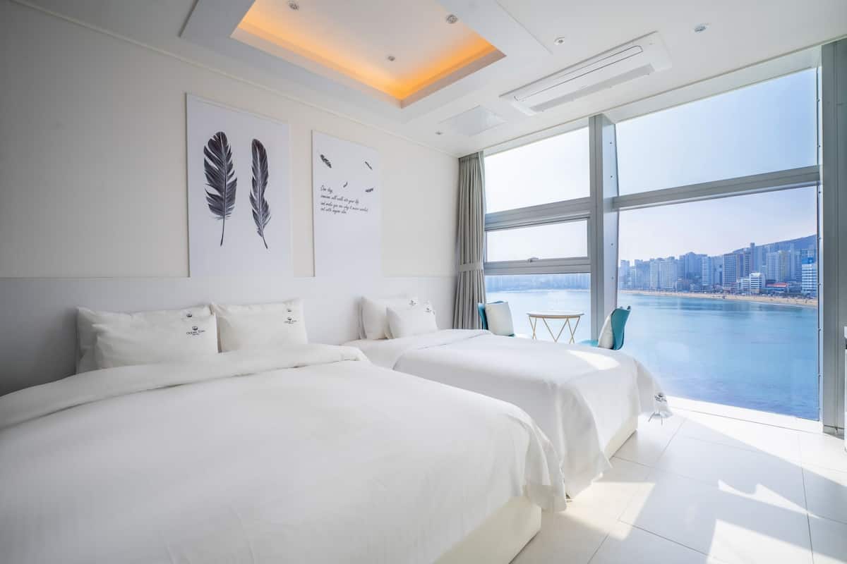 Ocean Twin Room, Sea View | 1 bedroom, down comforters, individually decorated