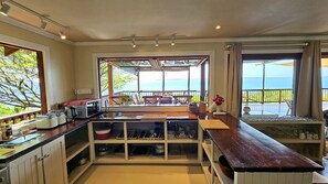 Panoramic Villa, 4 Bedrooms | Living area | 95-cm flat-screen TV with satellite channels, TV - Casa Karibu at Santa Maria Machangulo Mozambique (Machangulo)