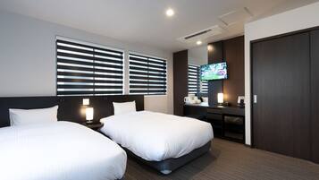 Habitación estándar con 2 camas individuales | Ropa de cama de alta calidad, edredones de plumas, caja fuerte