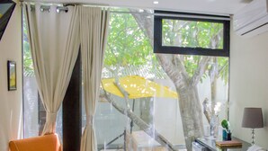 Deluxe Room, Courtyard View | Minibar, desk, laptop workspace, blackout drapes - Hotel Santa Clara (Monte Cristi)