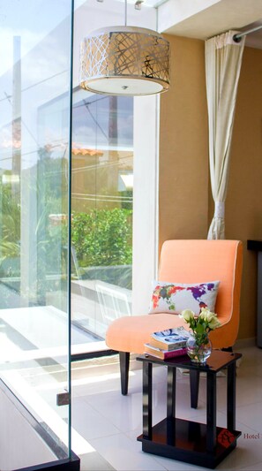 Deluxe Room, Courtyard View | Minibar, desk, laptop workspace, blackout drapes