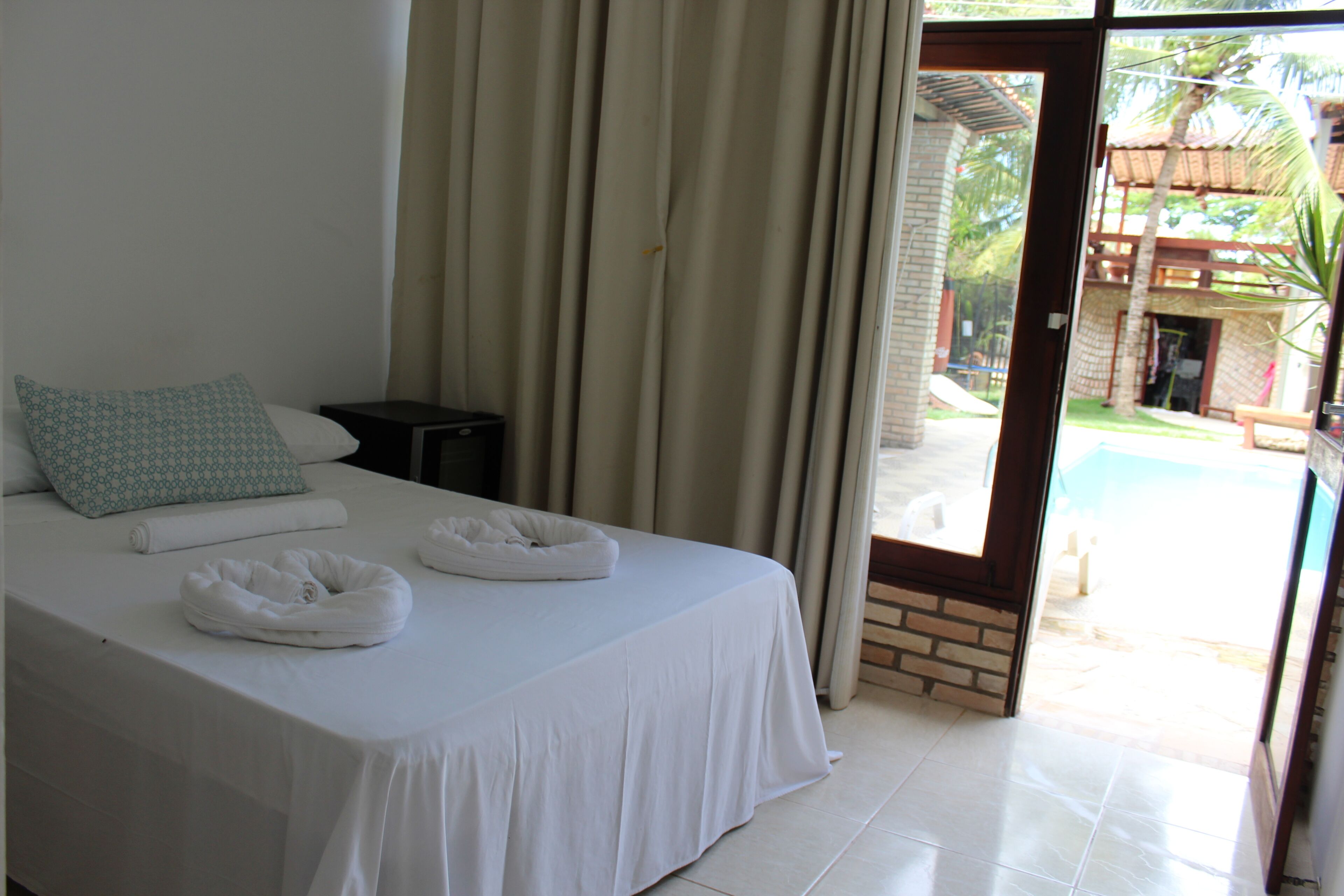 Double Room, Pool View | Blackout drapes, iron/ironing board (on request), WiFi (free)