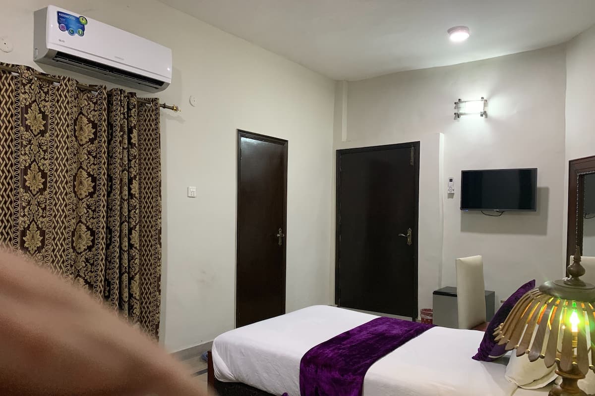 In-room safe, blackout curtains, iron/ironing board, rollaway beds