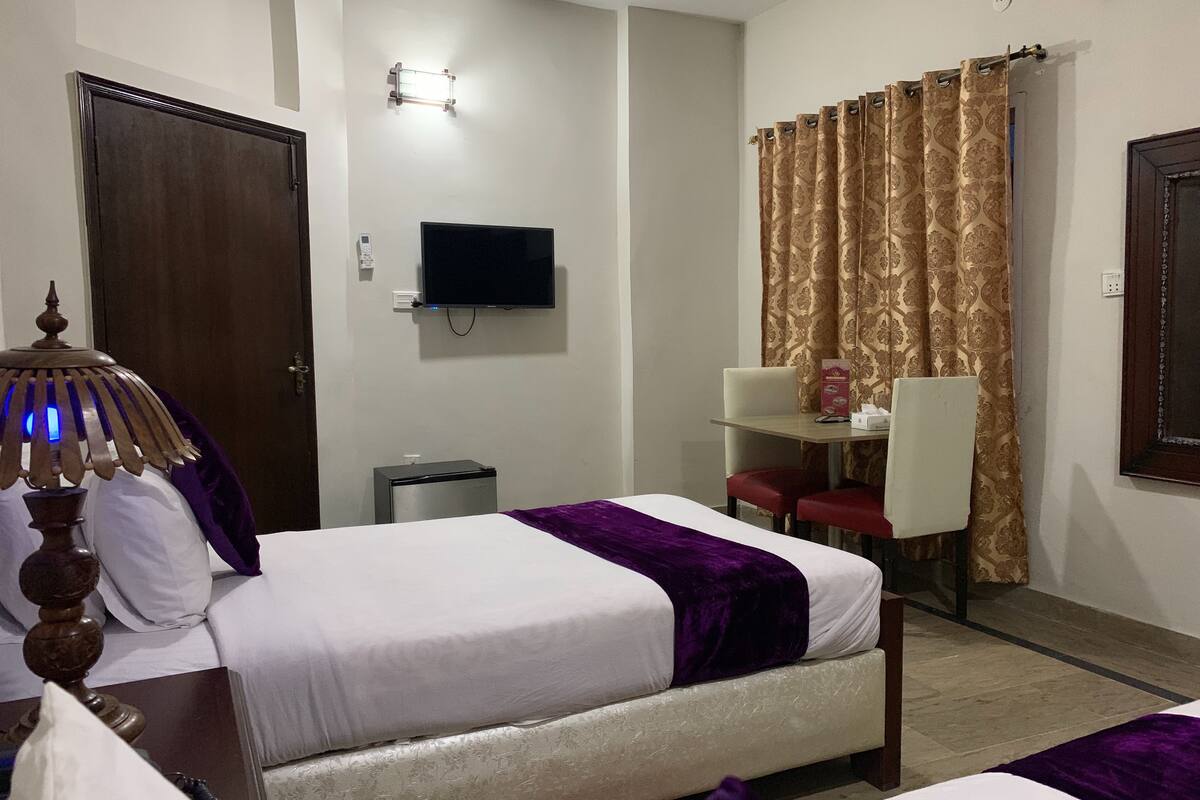 In-room safe, blackout curtains, iron/ironing board, rollaway beds