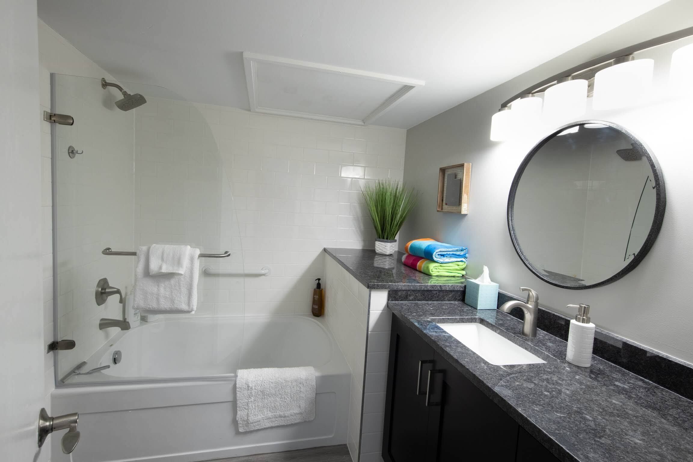 Combined shower/tub, hair dryer, towels, soap