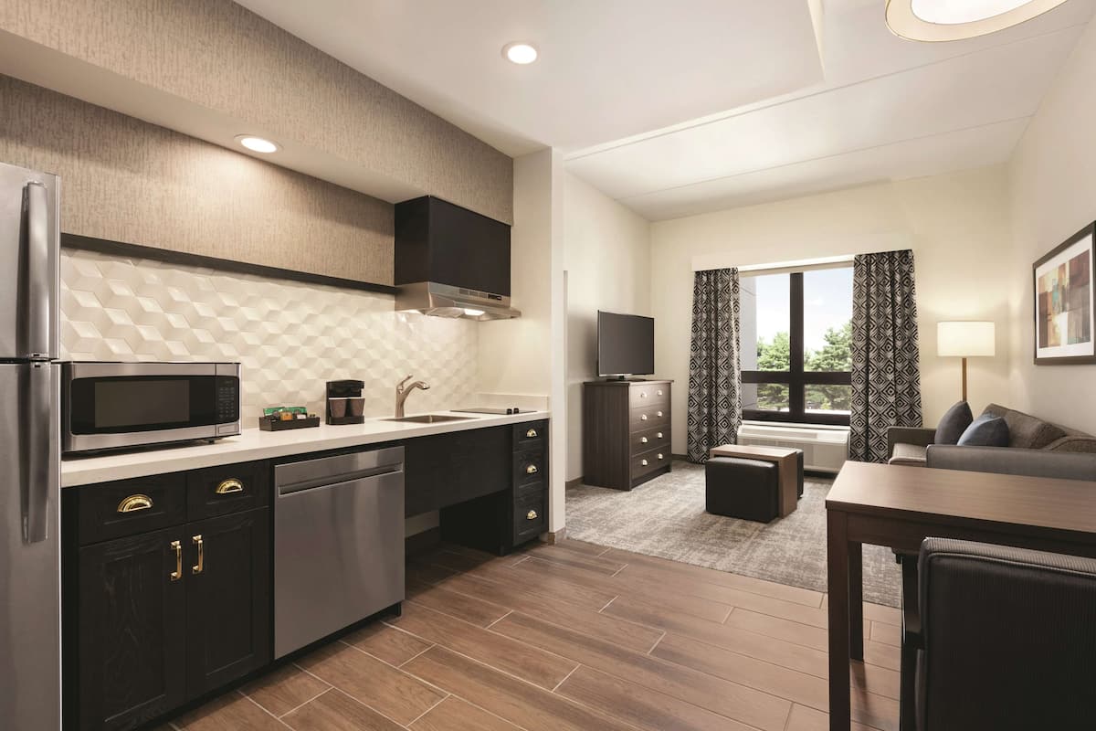 suite, 2 queen beds, accessible, bathtub | private kitchen | full-sized fridge, microwave, stovetop, dishwasher