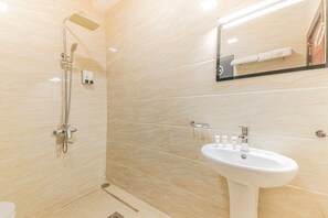 Standard Triple Room | Bathroom | Shower, free toiletries, towels - Alpha Suites Hotel (Salalah)